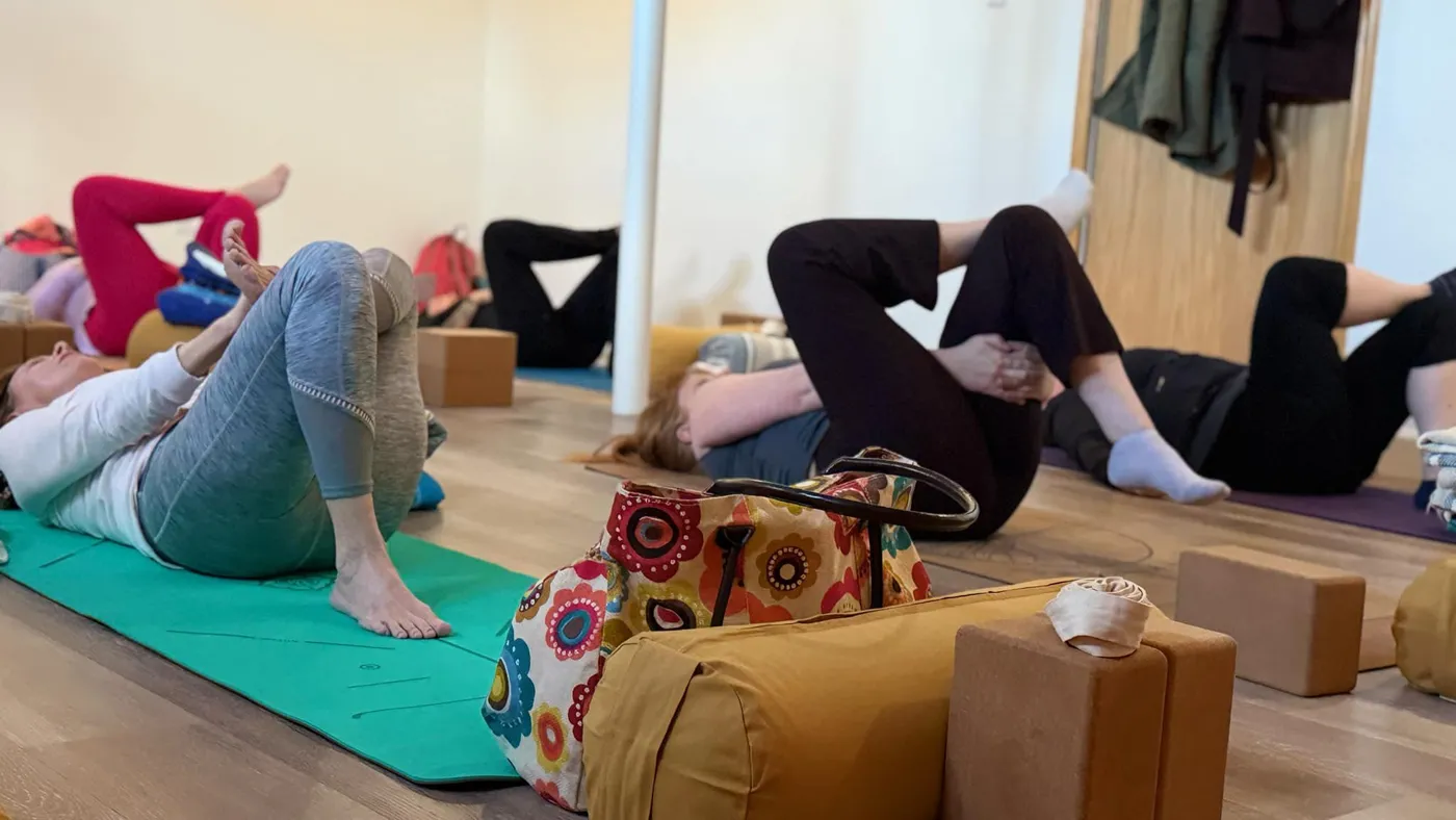 Students in restorative posture in the Temiskaming Yoga studio